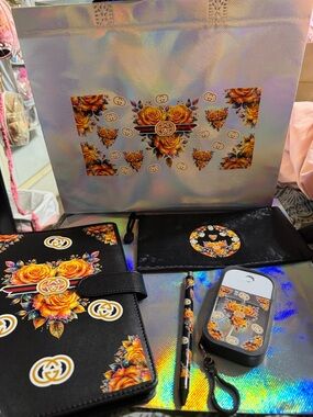 Black and yellow A5  binder with matching pen, pouch, sanitizer spray & tote.